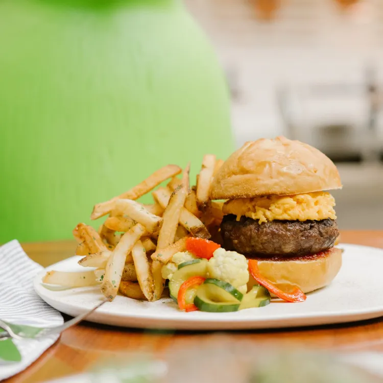 The Hive signature dishes Pimento Cheese with Bacon Jam, Pan Seared Scallops, The Hive Burger, Ricotta Gnudi